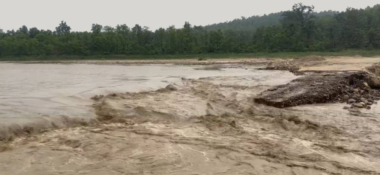 Collapsed Vinayi Khola diversion washed away by floods on Narayanghat-Butwal highway in Eastern Nawalparasi, blocking traffic amid heavy rainfall and landslides.