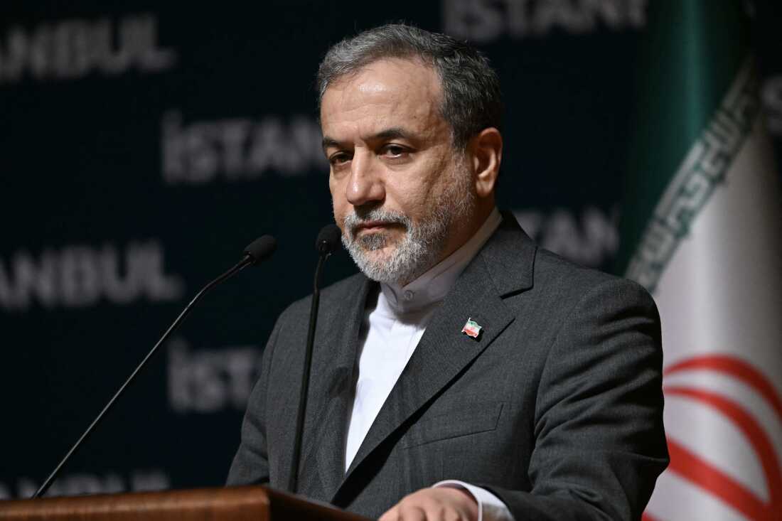 Iranian soldiers stand guard in Tehran as tensions with Israel ease after 12-day conflict.