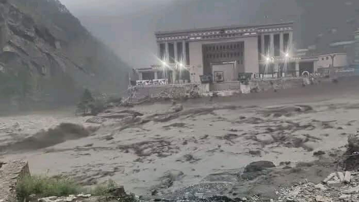 Floodwaters from the Bhotekoshi River submerge structures in Rasuwa district, Nepal, following a devastating flood that swept away the Miteri Bridge.
