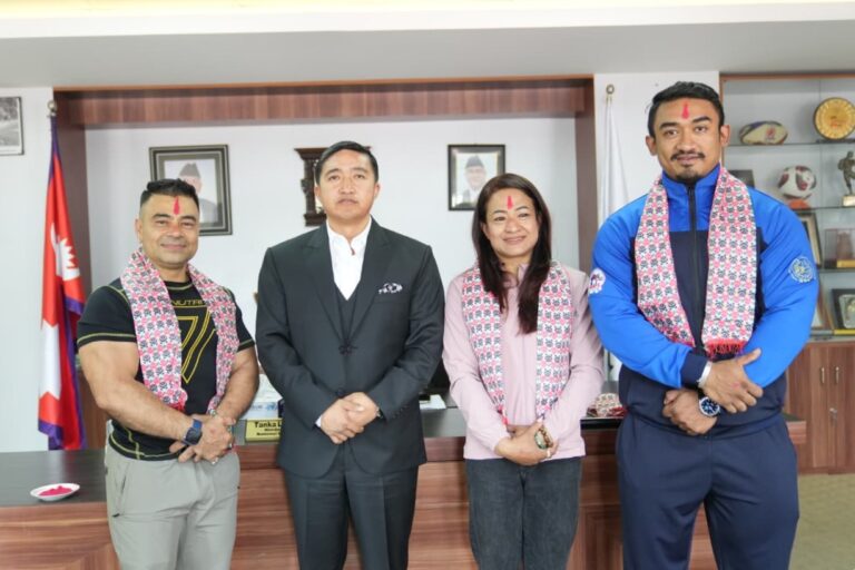 Nepali team members pose before departing for the Asian Bodybuilding and Physique Championship in Bangkok, Thailand.