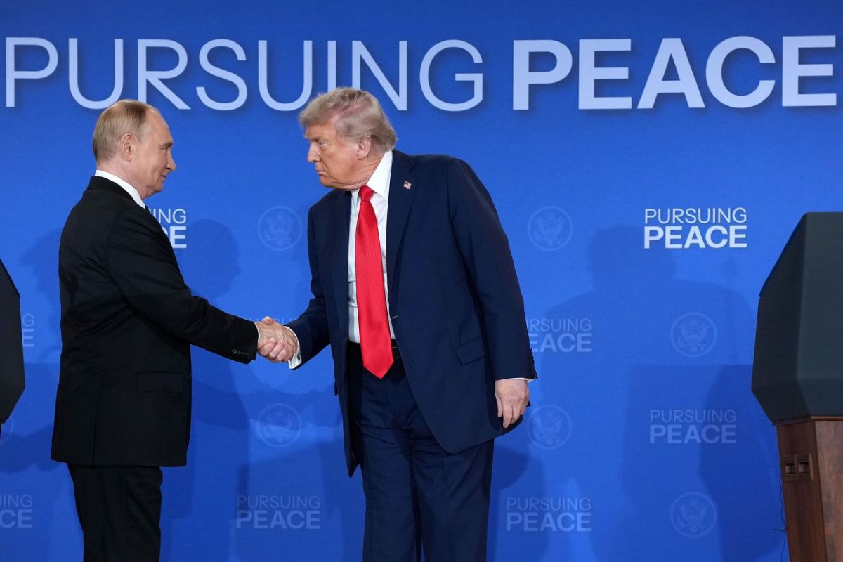 U.S. President Donald Trump greets Russian President Vladimir Putin on the red carpet at a joint military base in Anchorage, Alaska, during their three-hour summit. Both leaders described the talks as positive, with progress made on several issues.