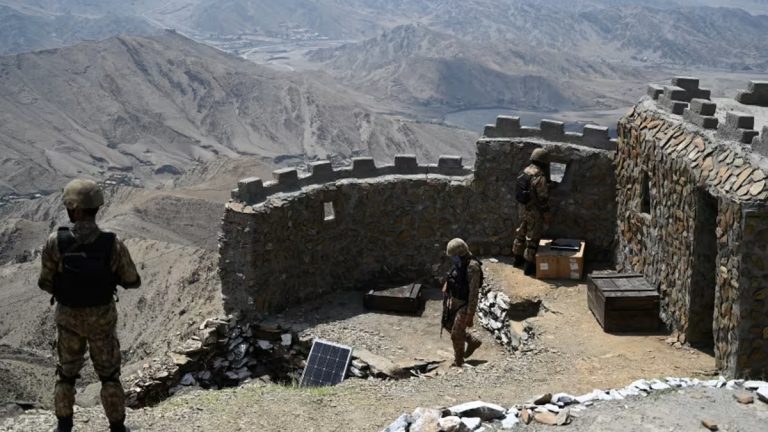 Pakistani and Afghan soldiers exchange heavy fire along the border at night amid rising tensions between the two countries.