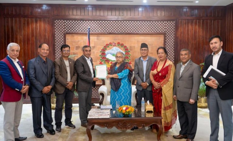 Prime Minister Suśīlā Karki meeting representatives of the Śaṅkhadhar Sākhwā Foundation in Bhaktapur to discuss including Nepal Sambat on future Nepali banknotes.