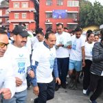 Runners compete in a 4km road race organised in Kathmandu to mark the 74th International Customs Day.