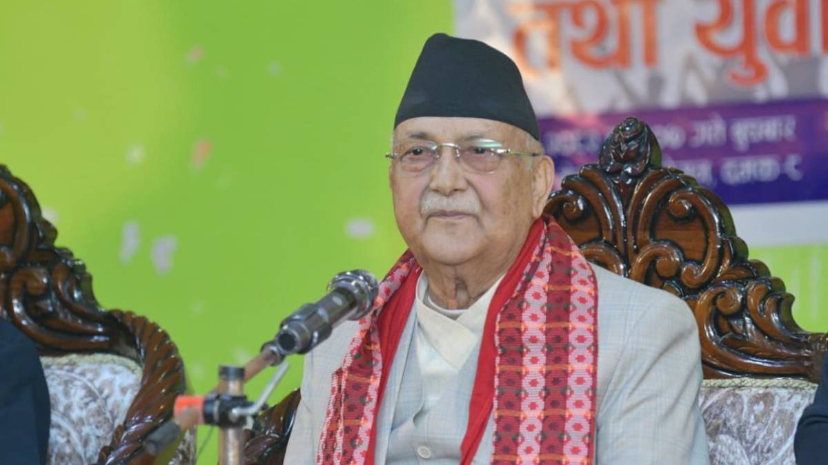 KP Sharma Oli addresses a meeting in Jhapa, speaking about fear among squatters and urging voters to evaluate political leaders carefully.