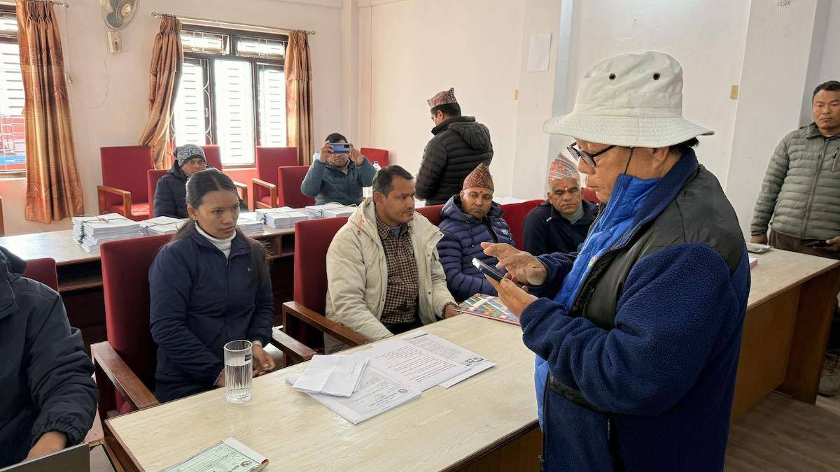 Mahabir Pun speaks to journalists after registering his candidacy as an independent candidate in Myagdi.