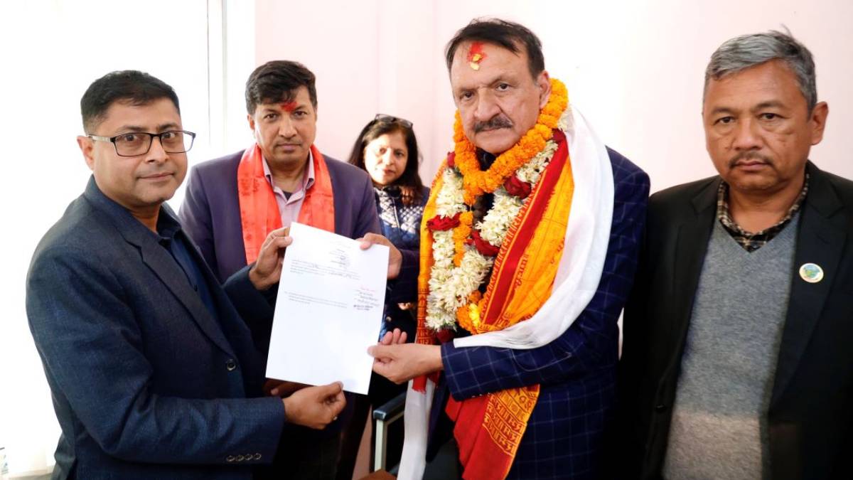 Nepali Congress senior leader Prakash Sharan Mahat registers his candidacy at the Office of the Chief Election Officer in Nuwakot.