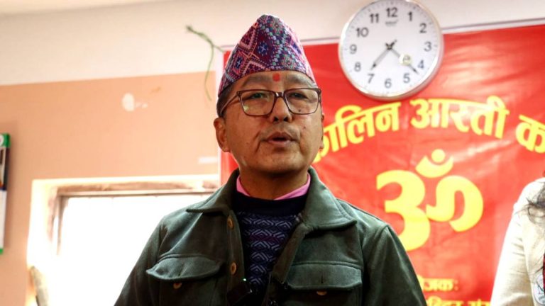 Rajendra Prasad Lingden, chair of the Rastriya Prajatantra Party, addresses supporters during a door-to-door election campaign in Kathmandu Constituency No. 2.