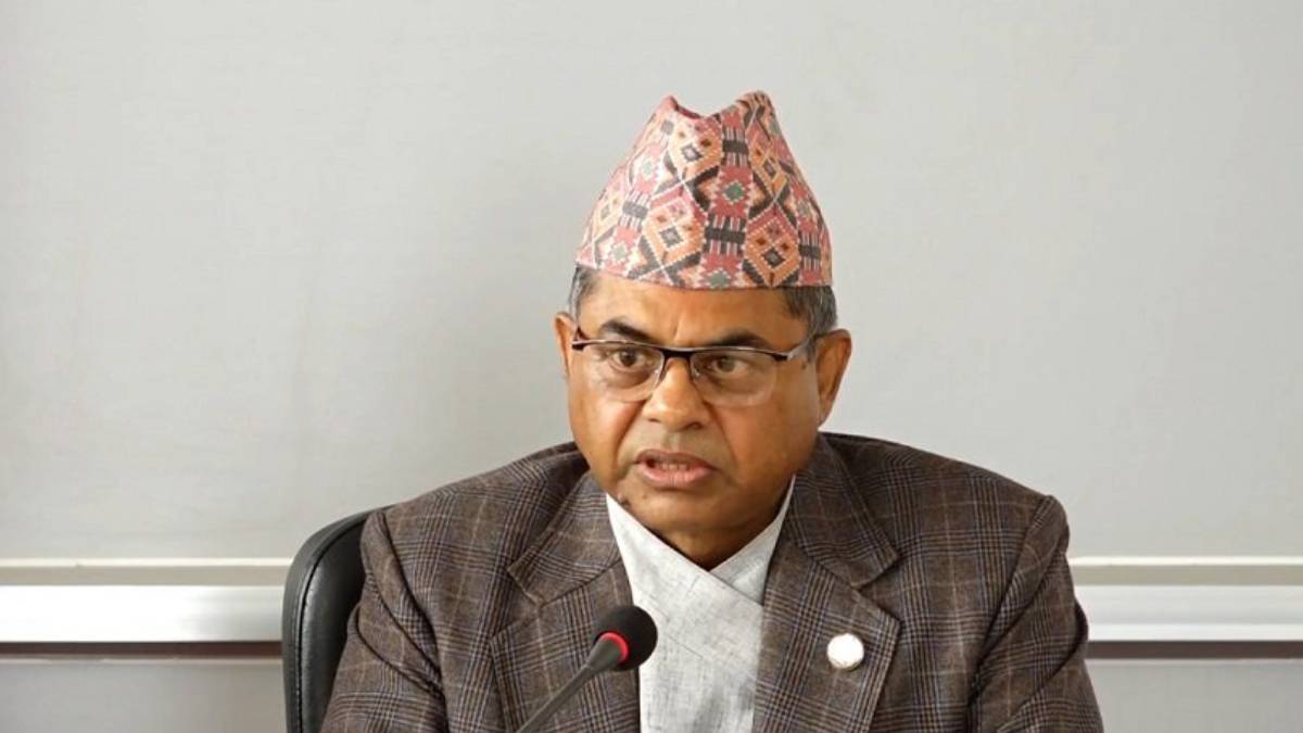 Law Minister Anil Kumar Sinha speaking at the National Assembly in Kathmandu on constitution implementation and legal reforms.