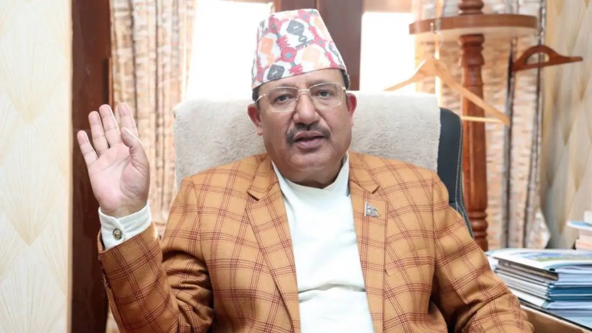 Acting Chief Election Commissioner Ram Prasad Bhandari speaking at a World Radio Day program in Kathmandu.