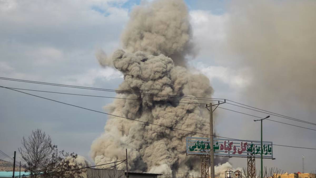 Smoke rises over Tehran following reported US-Israel strikes as casualties exceed 700, according to HRANA.