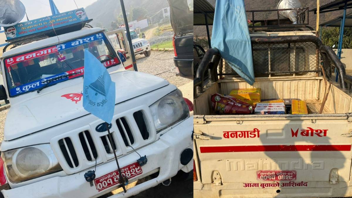 Police officers inspect a jeep bearing the Rastriya Swatantra Party flag after seizing rice and alcohol in Sallibazar, Salyan.