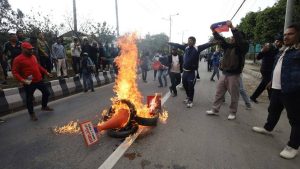 UML supporters protest in Kathmandu after K. P. Sharma Oli arrest, burning tires at Babarmahal