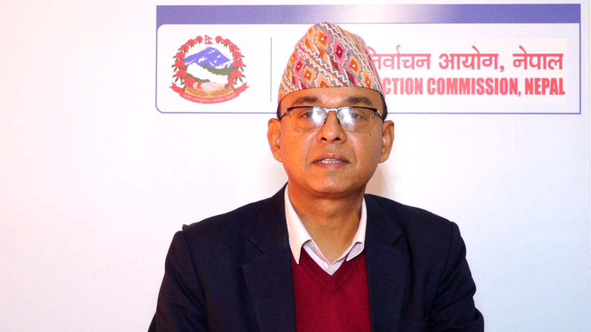 Voters standing in line at a polling station during Nepal’s House of Representatives election.