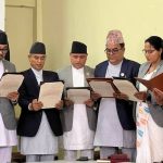 Newly appointed Gandaki Province ministers read oath documents during swearing-in ceremony in Nepal