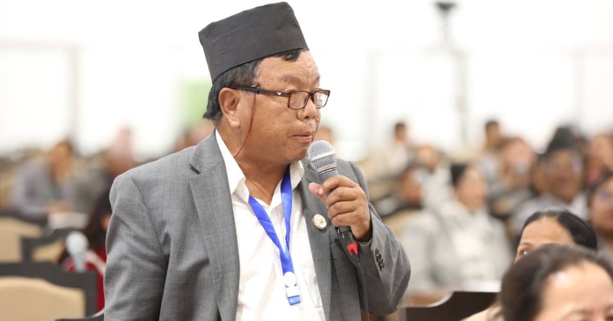 Mahabir Pun speaking with microphone during Nepal Parliament session in Kathmandu