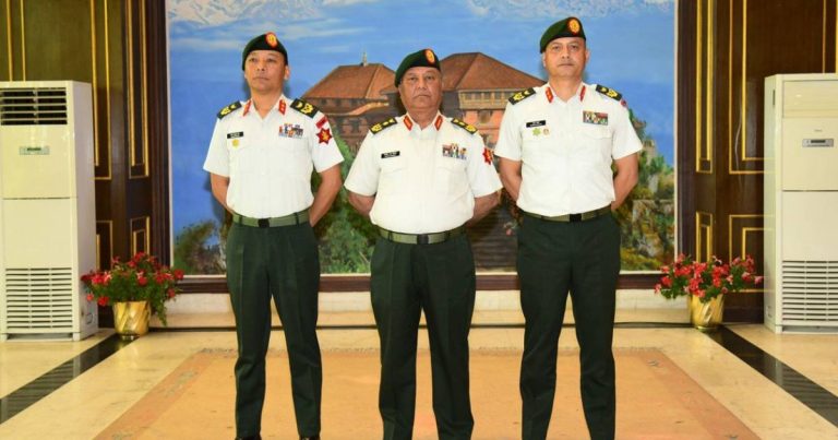 Three Nepal Army officers in uniform stand during Major General promotion ceremony in Kathmandu