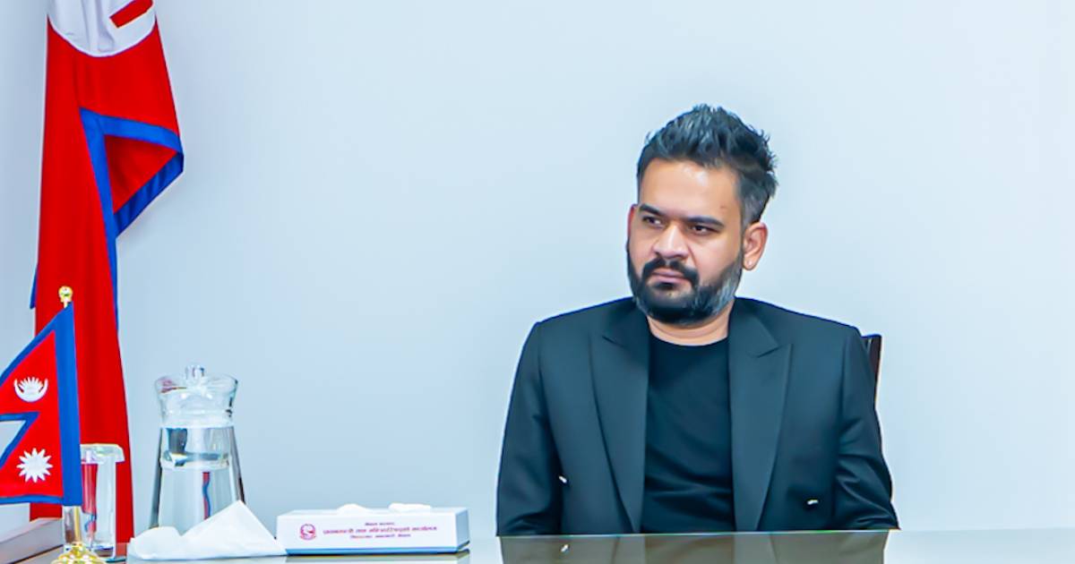 PM Balen Shah seated during a meeting with Nepal flag in background