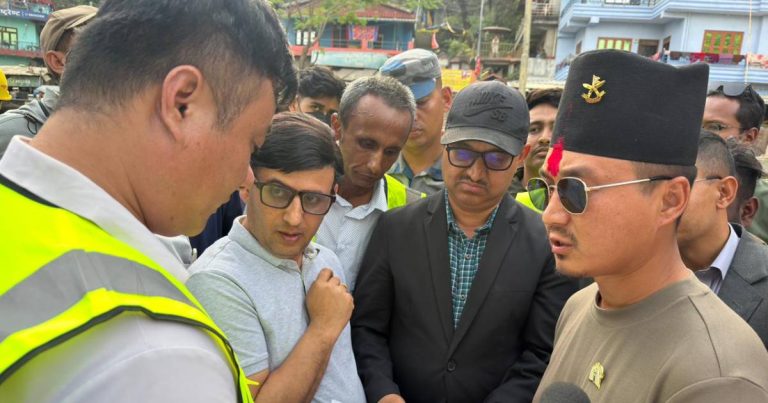 Sudan Gurung discusses with officials during Narayanghat–Butwal road inspection in Nepal