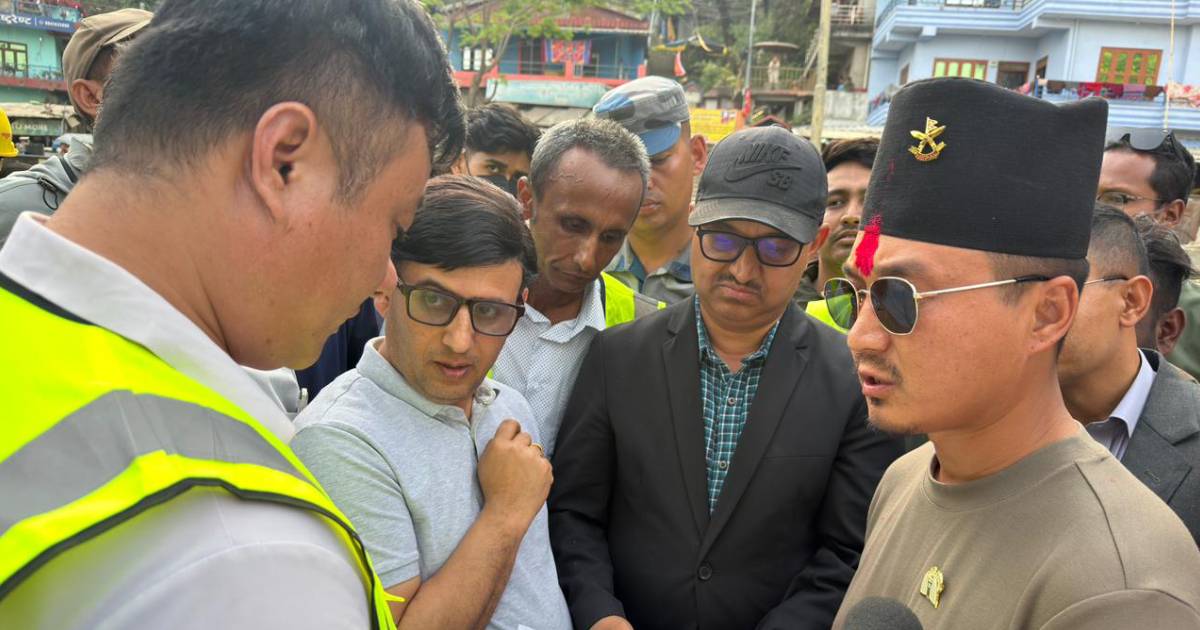 Sudan Gurung discusses with officials during Narayanghat–Butwal road inspection in Nepal
