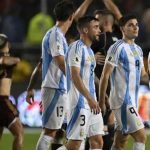 Lionel Messi and Argentina players walking on the field during a match