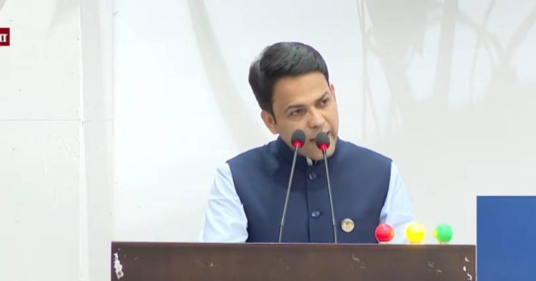 Bipin Kumar Acharya addresses the House of Representatives during a parliamentary meeting