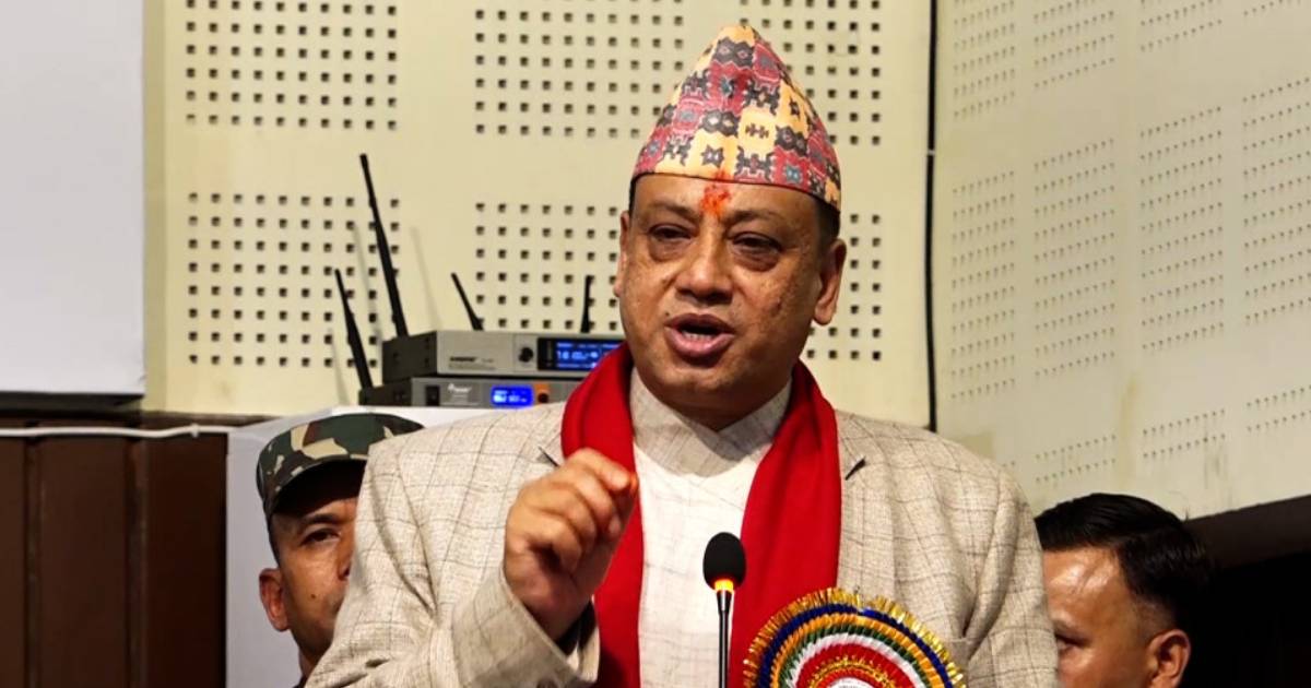 Indra Bahadur Baniya speaking at an event after raising concerns over raid at his residence and office