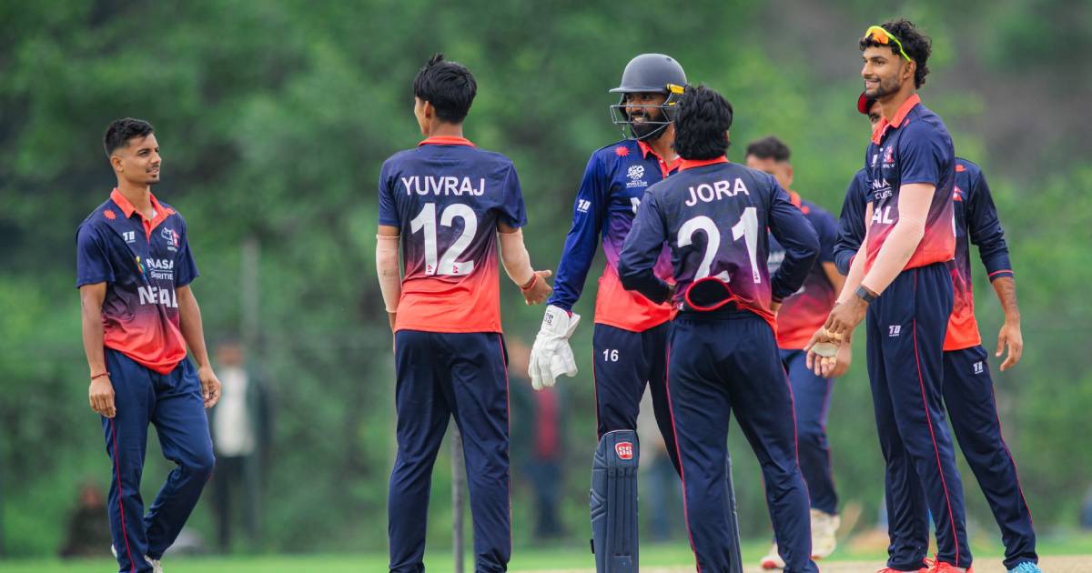 Nepal A cricket players celebrate during the practice series match against Scotland at Upper Mulpani Ground