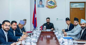 Balen Shah chairs a meeting with officials seated around a conference table