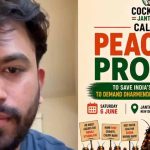 Abhijeet Dipke beside a Cockroach Janta Party poster calling for a peaceful protest in New Delhi
