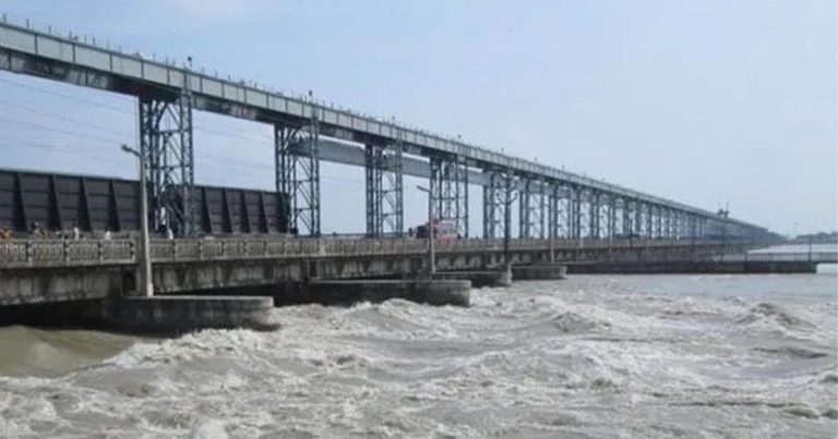Saptakoshi River surging beneath Koshi Barrage gates